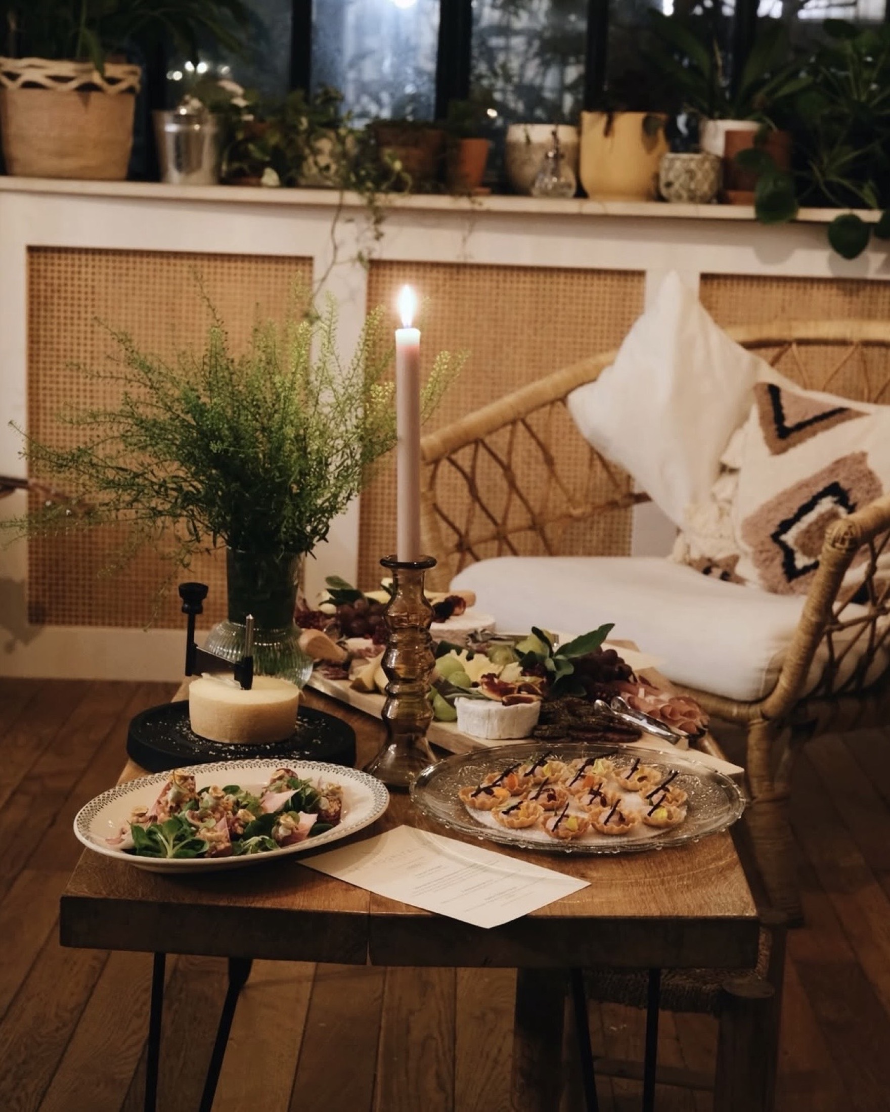 Charcuterie and cheese, candlelit table